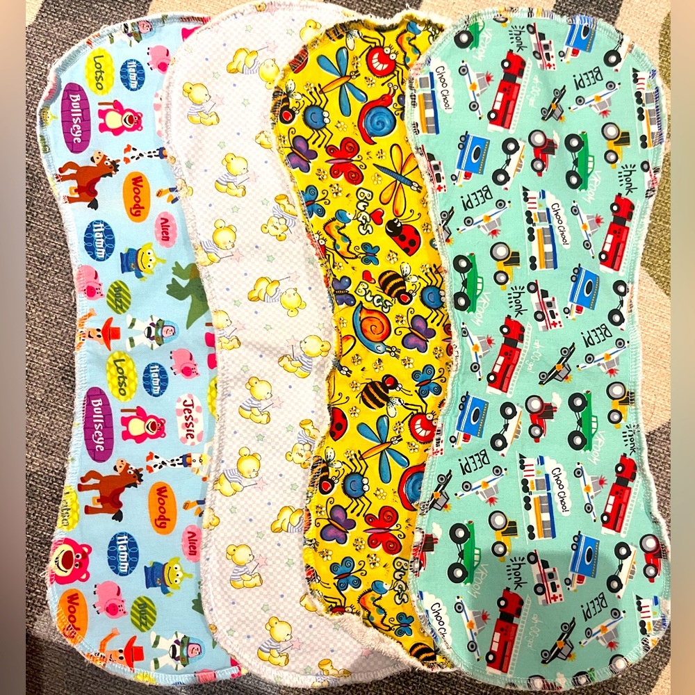 Brand new burp rags x4 with cute playful prints